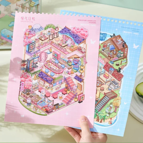 Carnet à spirales contenant 6 scènes de stickers isométrique 3D à composer soi-même sur le thème des maisons, restaurant de sushi. Activité créative pour adulte pour gérer le stress.