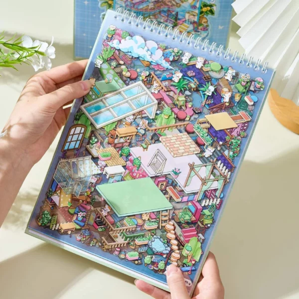 Carnet à spirales contenant 6 scènes de stickers isométrique 3D à composer soi-même sur le thème des maisons. Activité créative pour adulte pour gérer le stress.